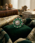 THE EMERALD EMPRESS HALO RING