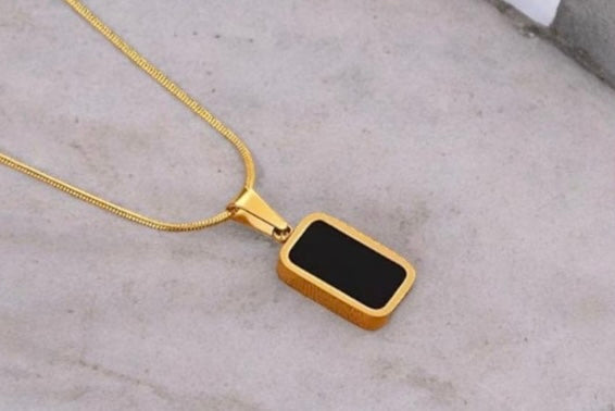THE DUAL AURA | REVERSIBLE MOTHER - OF - PERAL & ONYX PENDANT